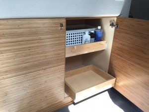 48" of storage cabinets in upstairs bathroom uses "tweener" space.