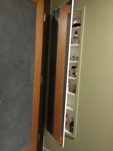 60" tall Medicine Cabinets double as full length mirror and abundant storage.